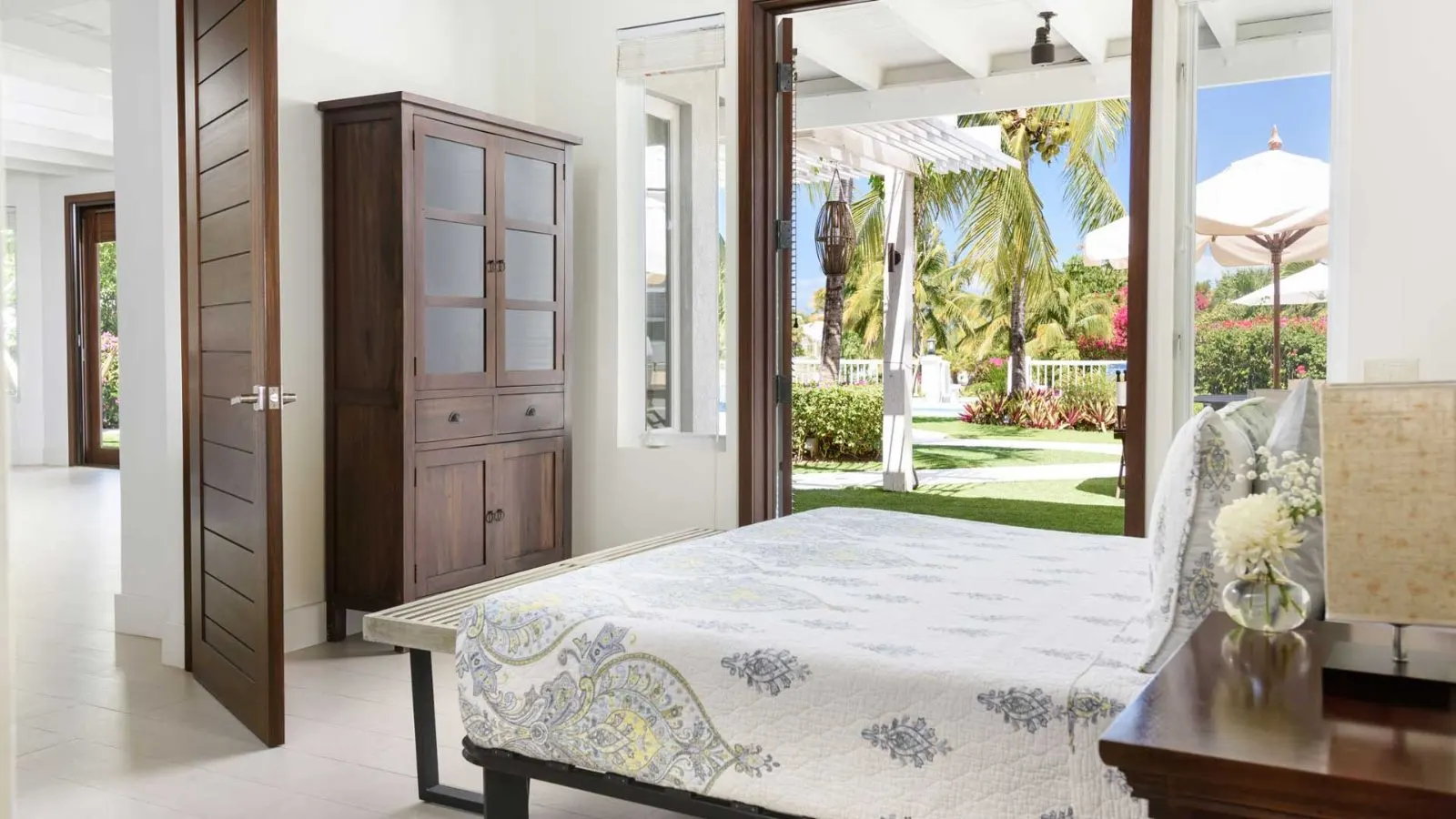 Bedroom Two, queen bed with soft linens and terrace access.